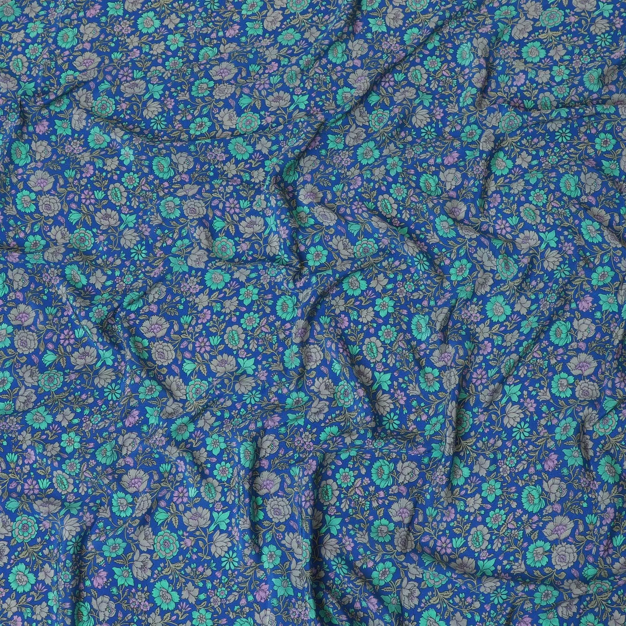 Royal blue silk crepe fabric with turquoise green, grey and lilac print in floral design-D8456