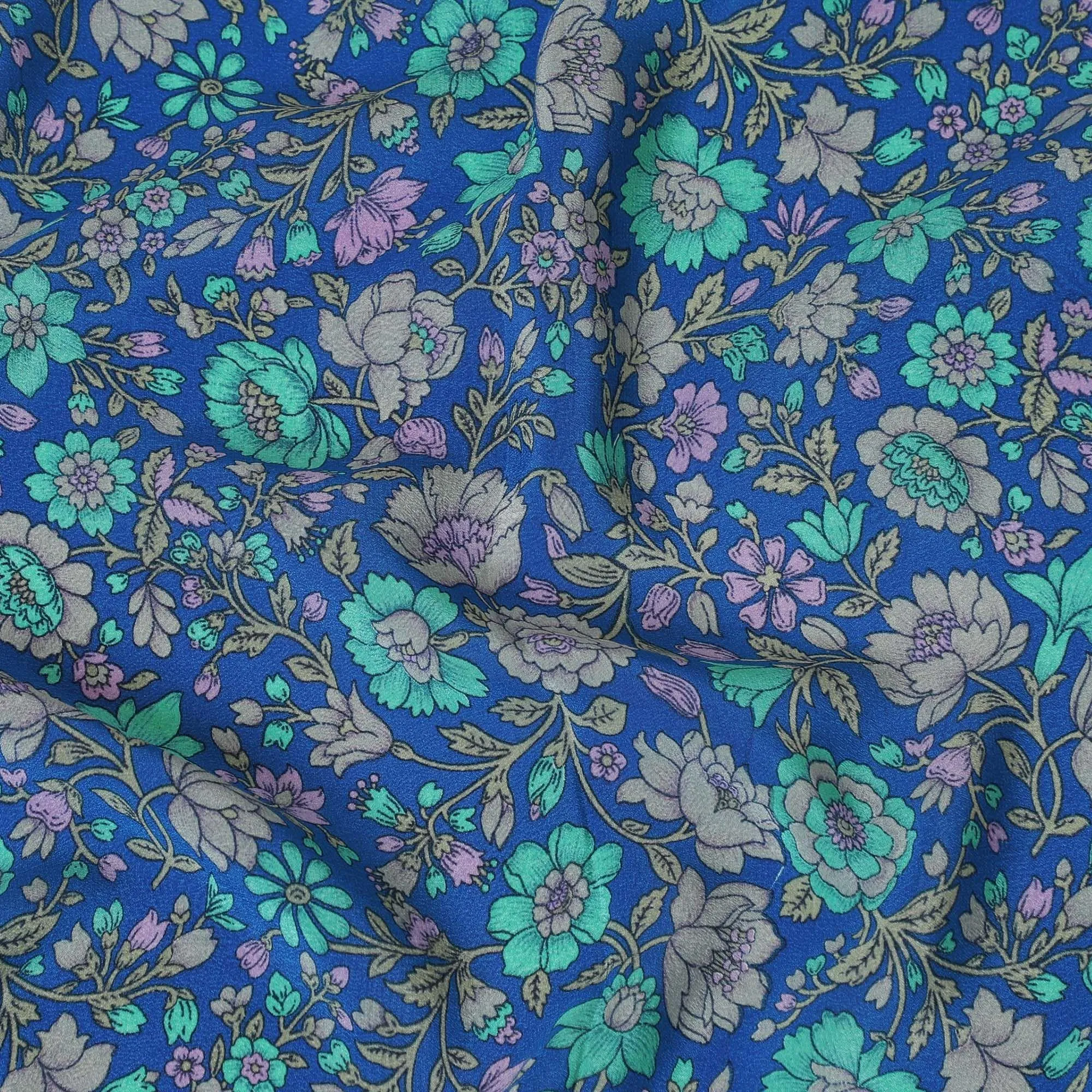 Royal blue silk crepe fabric with turquoise green, grey and lilac print in floral design-D8456